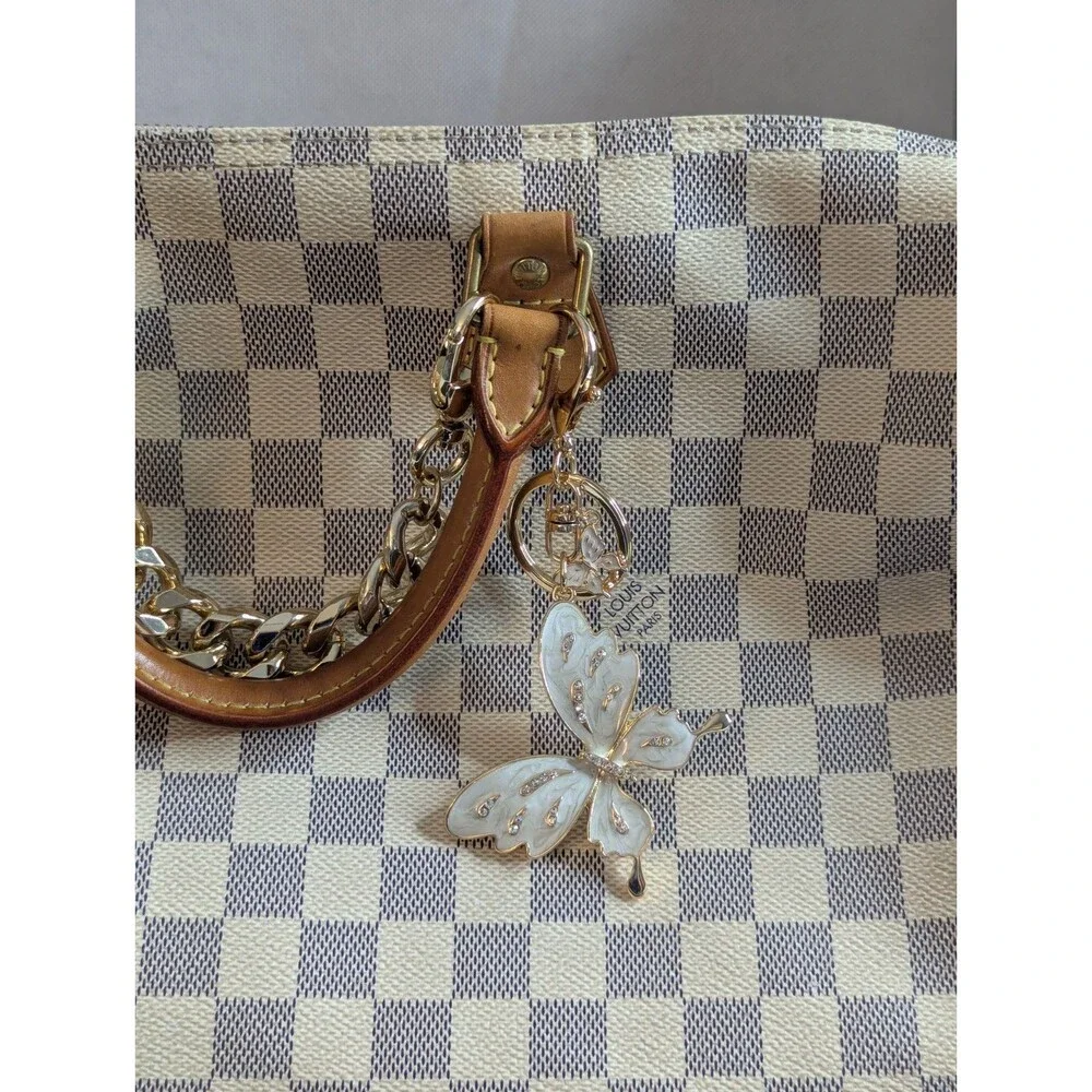Off Park gold tone